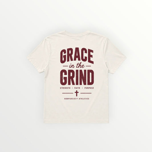 HoopSociety Grace in the Grind relaxed cotton tee in cream with a maroon back graphic featuring a cross design.