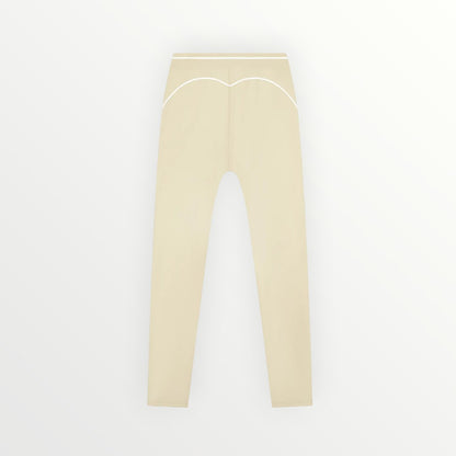 HoopSociety Heritage Contour performance leggings in beige with white contrast seam detailing on the back.