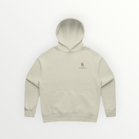 HoopSociety Heritage relaxed hoodie in beige midweight fleece with drop shoulders and minimal chest logo.